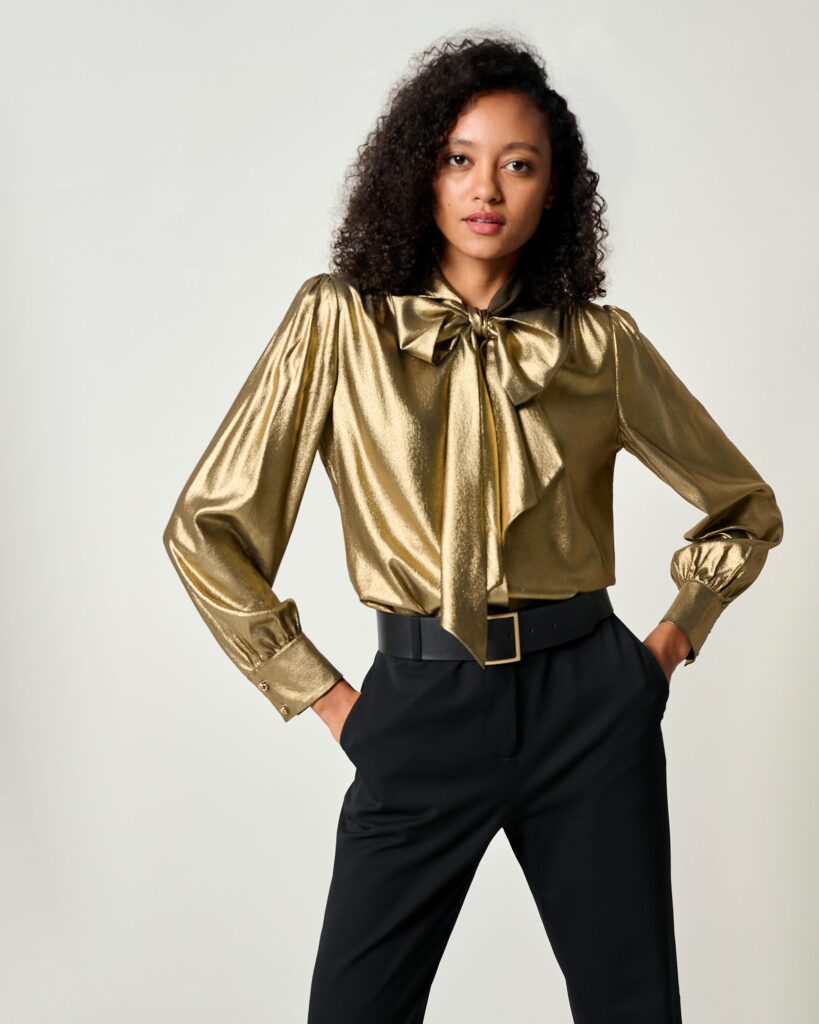 Gold blouse and black pants via Lilysilk