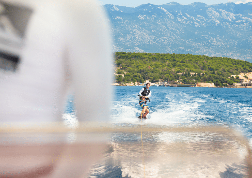 A man wake boarding in Curaçao.