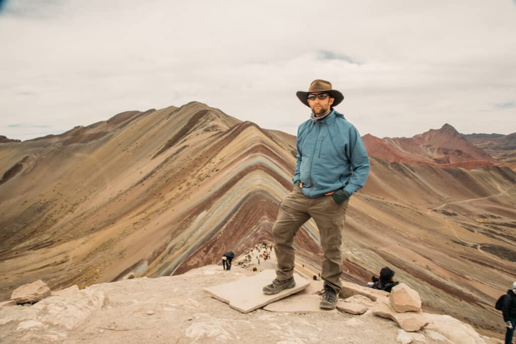 Zac on Rainbow Mountain in Peru wearing a TROPIFORMER 3D JACKET / VEST