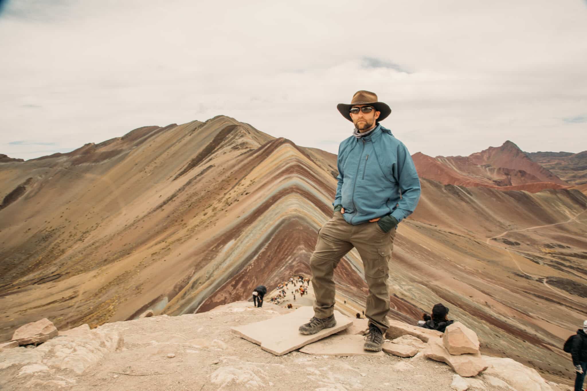 Zac on Rainbow Mountain in Peru wearing a TROPIFORMER 3D JACKET / VEST