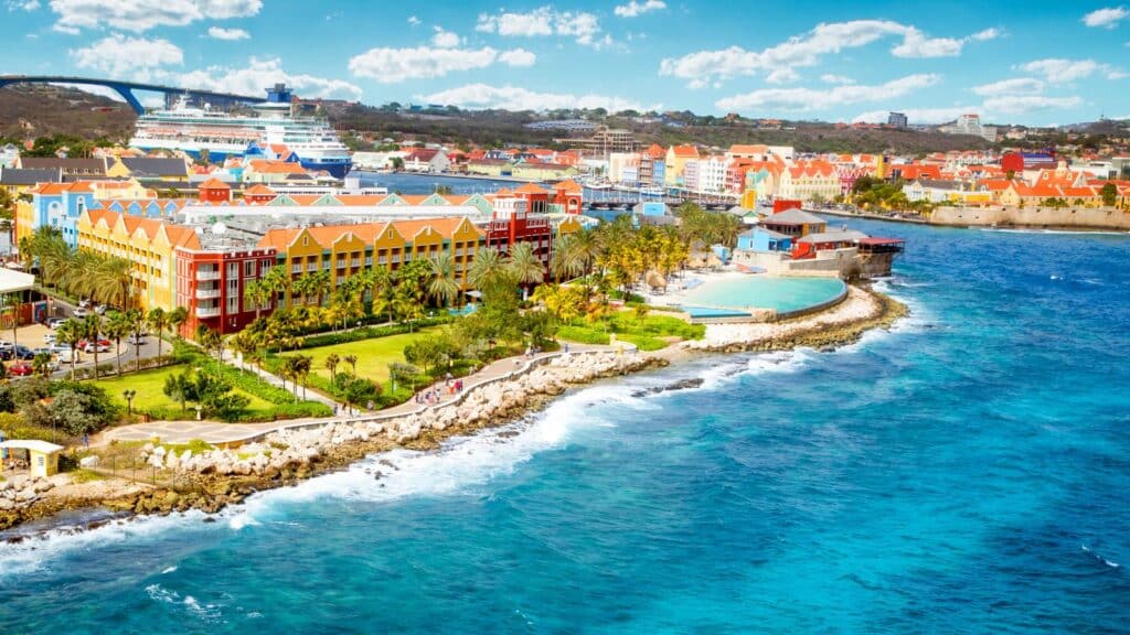 Curacao from above showing a cruise ship and a manmade beach.