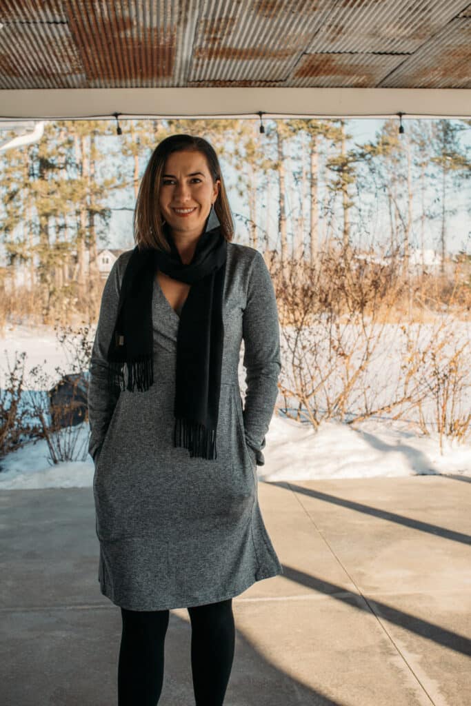 SCOTTeVEST - Long Sleeve Daphne Dress paired with a black scarf