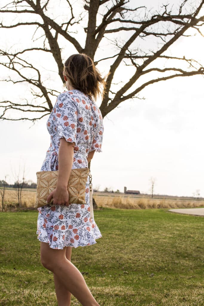 The back of my new Passion Lilie summer wrap dress and also a cork clutch from Carry Courage