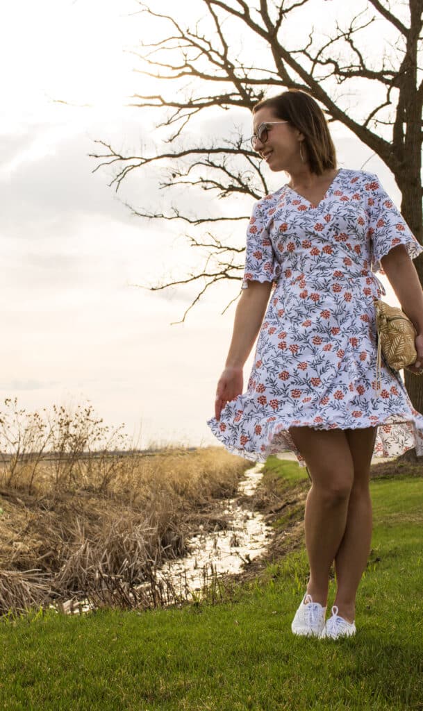 Floral wrap dress paired with white keds sneakers