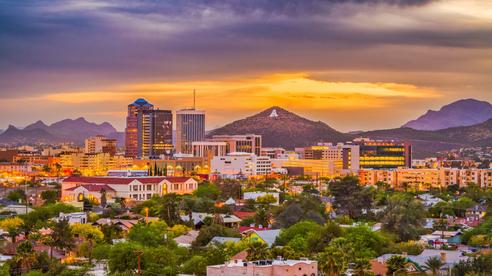 Tucson, Arizona, USA downtown skyline with Sentinel Peak at dusk. (Mountaintop "A" for "Arizona")