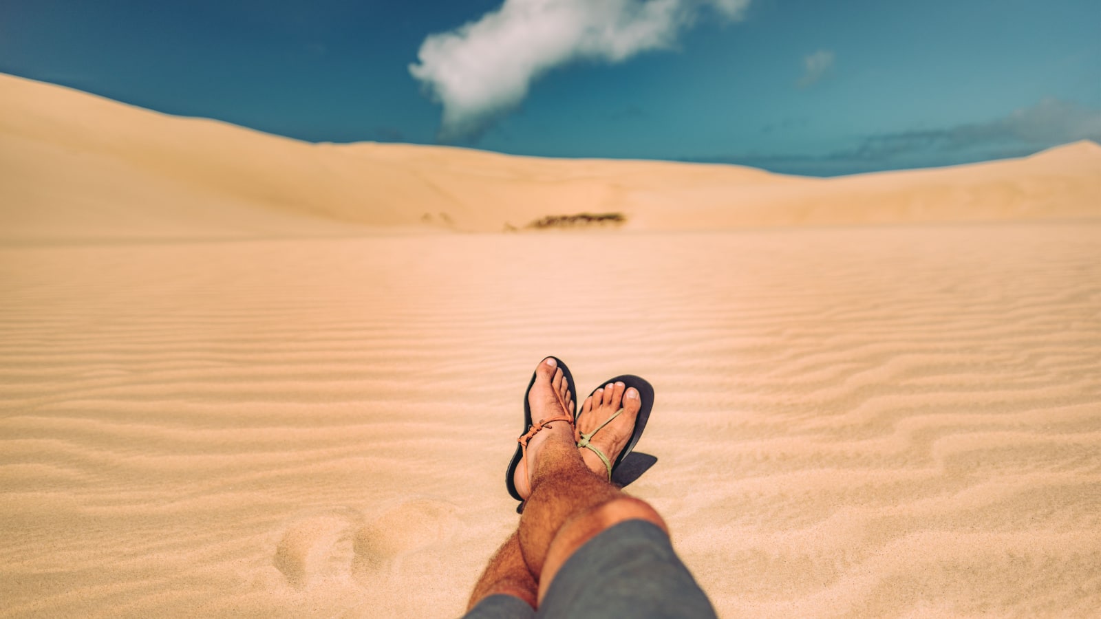 Chill in New Zealand on sand dune Xero Shoes Sandals