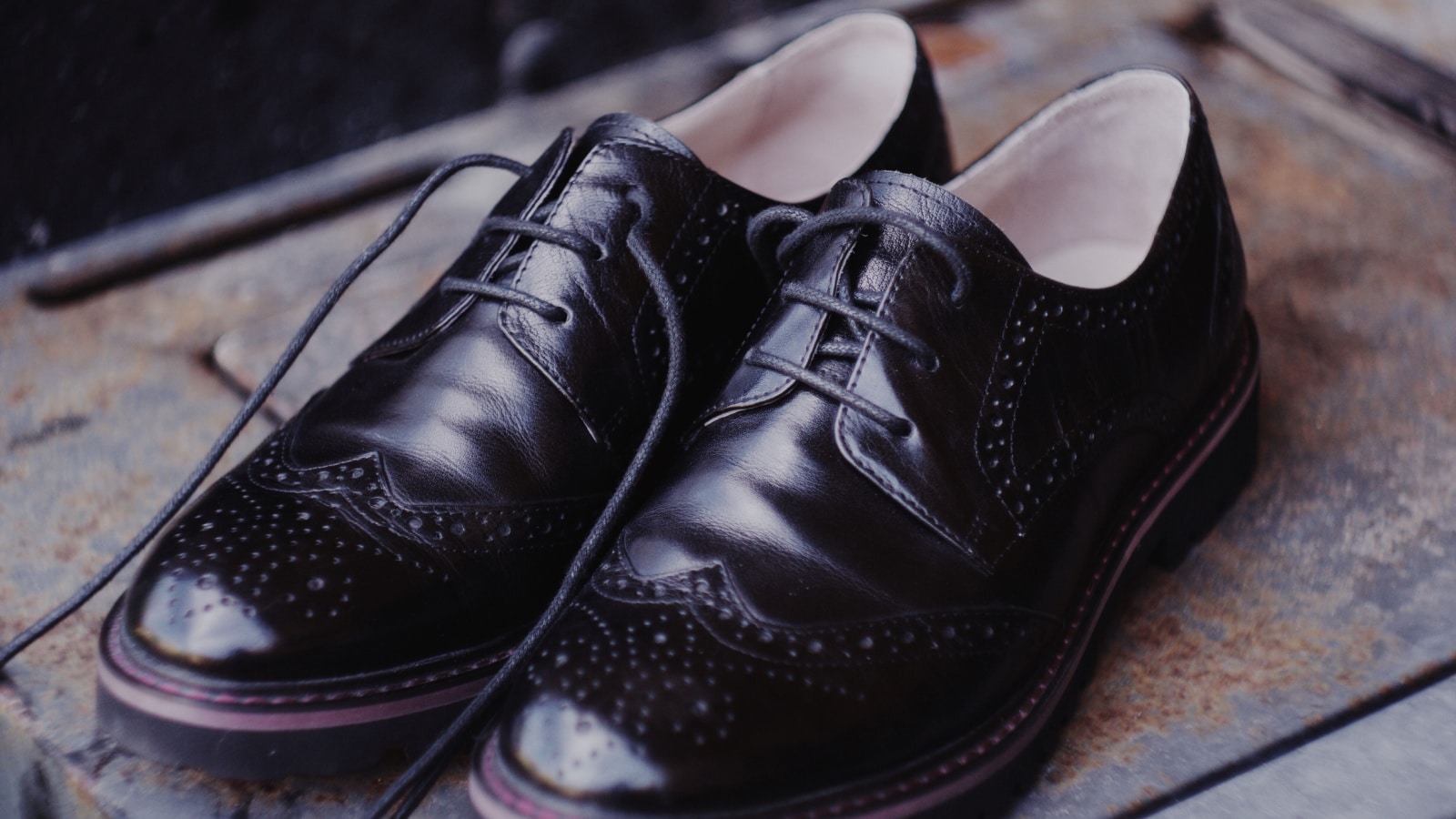 Smart casual. Genuine leather black woman’s oxfords. Formal classical shoes.