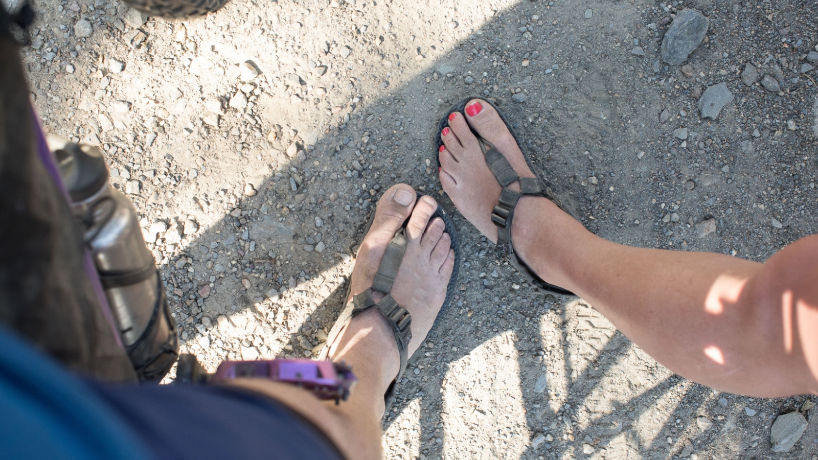 Malaga, Sierra Nevada / Spain - 12/10/2019: Bedrock sandals. His and hers.