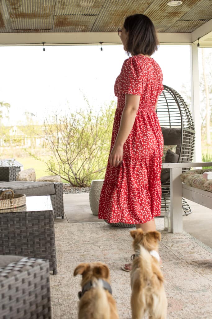 Red heart dress from Temu worn by Have Clothes WIll Travel on a patio