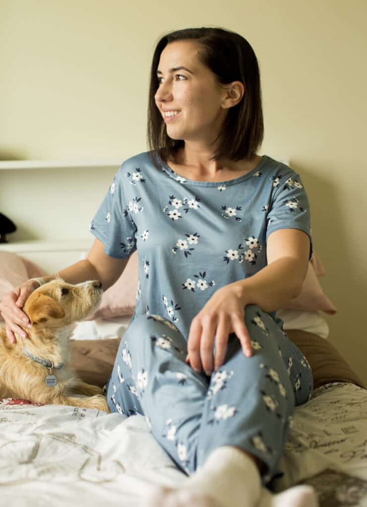 Cute Print Loose Pajamas by Kasmi Fashion Pajamas from Temy worn by Have Clothes, Will Travel while sitting on a bed with a small dog