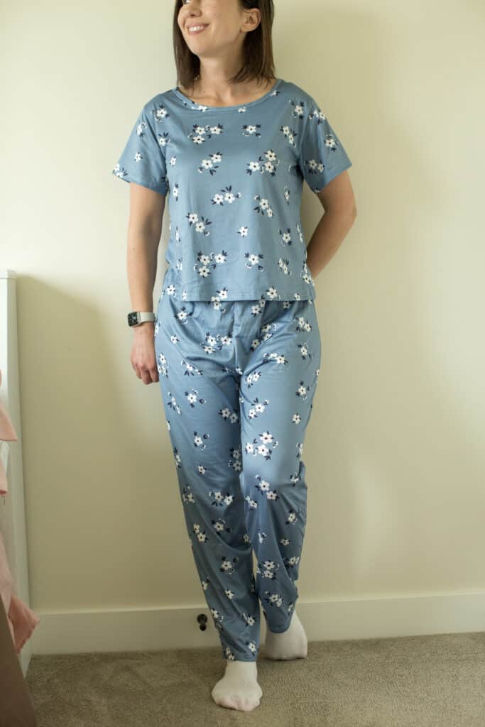 Cute Print Loose Pajamas by Kasmi Fashion Pajamas from Temy worn by Have Clothes, Will Travel while sitting on a bed with a small dog