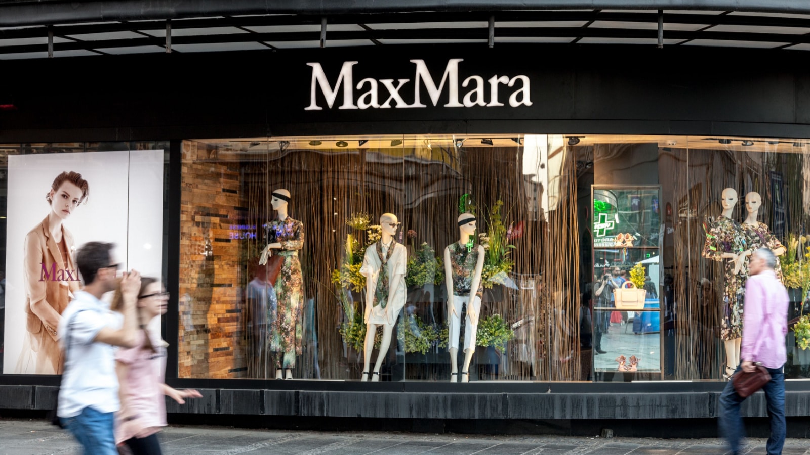 BELGRADE, SERBIA - APRIL 29, 2018: Max Mara logo on their main shop in Serbia. MaxMara Max Mara is an Italian fashion business marketing up-market ready to wear clothing