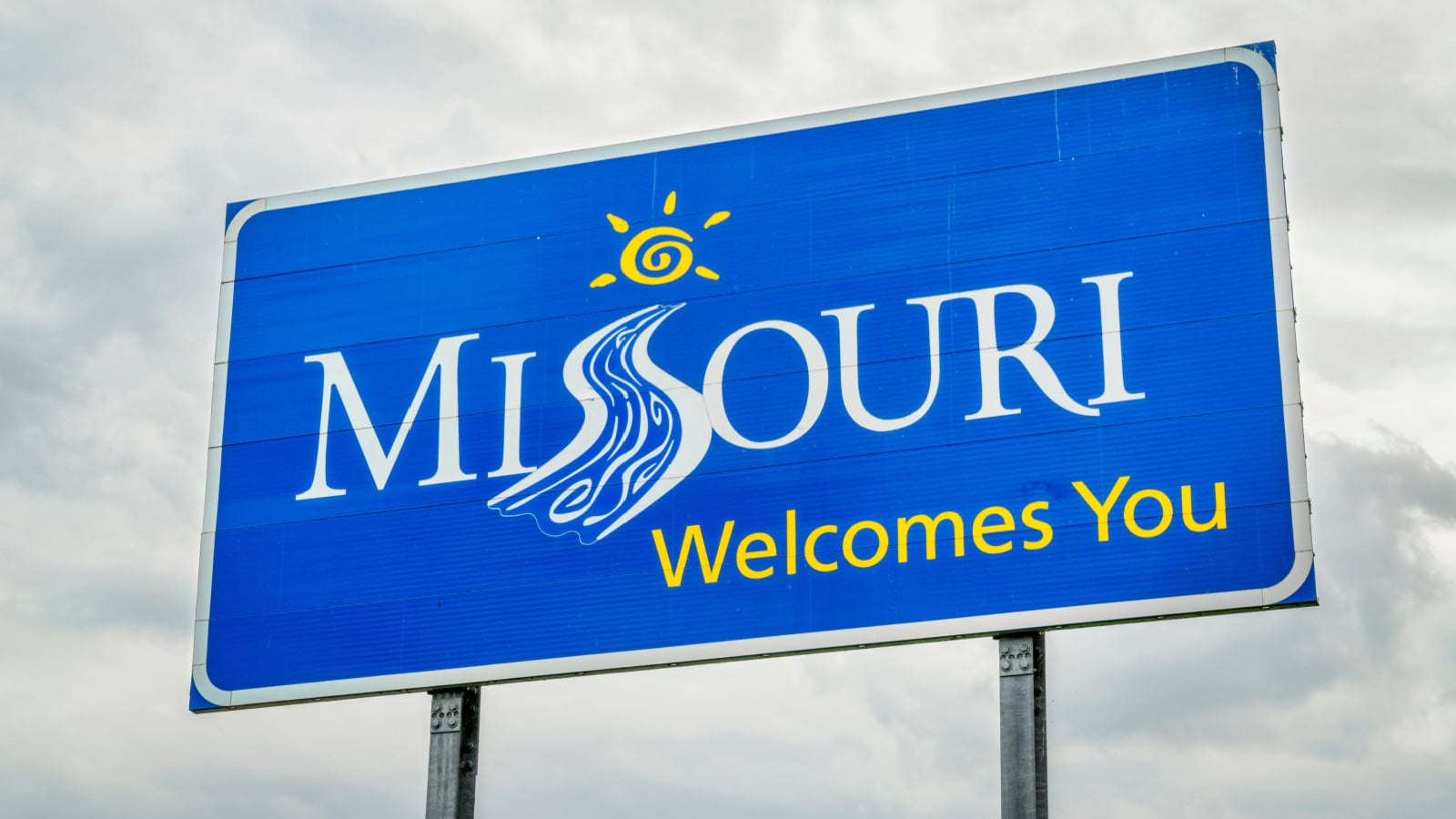 Missouri Welcomes You - a roadside sign at a state border with Illinois