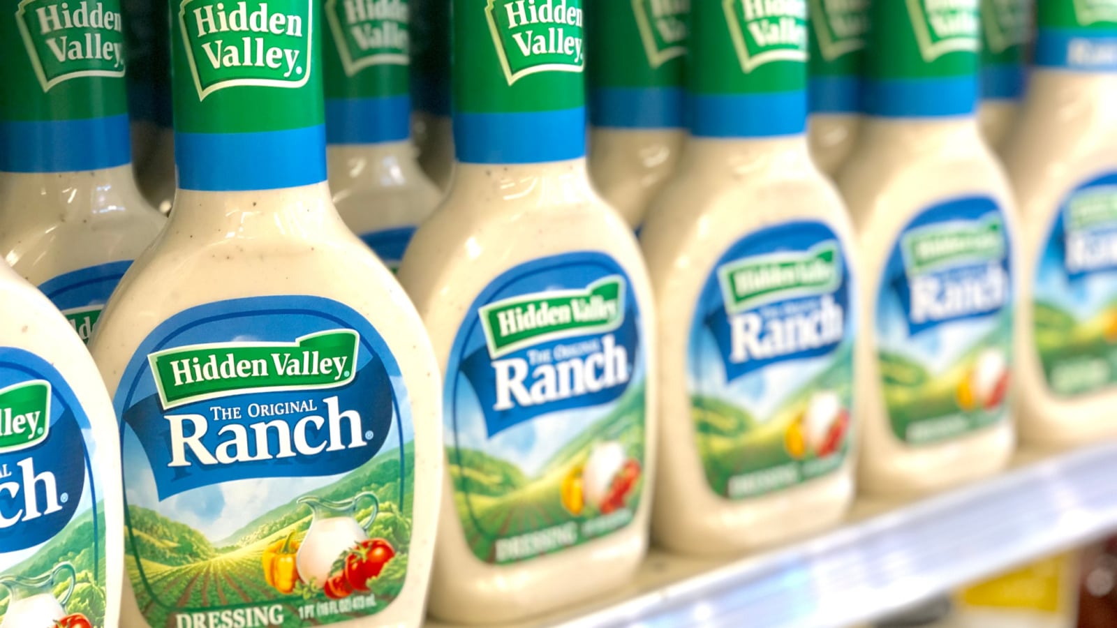 Black Mountain, NC / USA - May 21, 2019: This is a color photo of 16 oz. size bottles of Hidden Valley Ranch dressing on the shelf at a local grocery store.