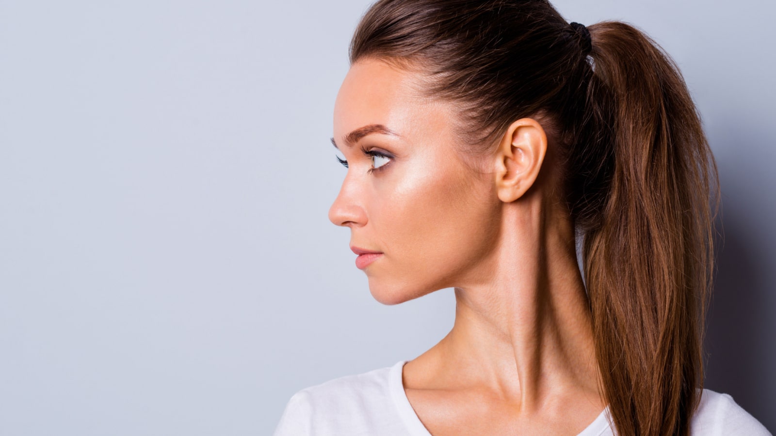 Close up side profile view photo amazing beautiful she her lady perfect appearance look side empty space not smiling reliable person wear casual white t-shirt clothes isolated grey background
