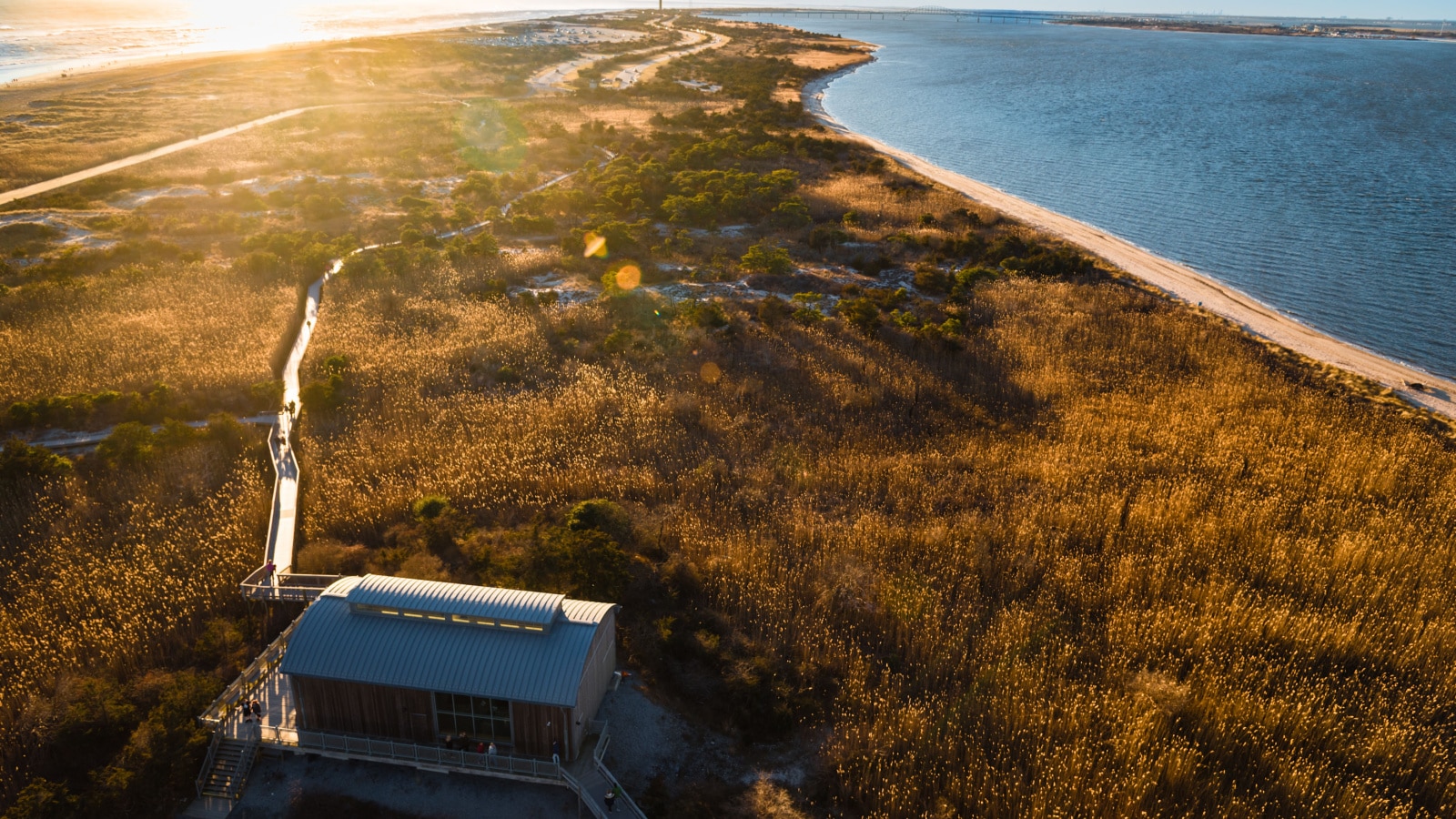 A gorgeous view of the Fire Island, New York, with a walking pier in the reeds. Captured on the top of the historic Fire Island Lighthouse.