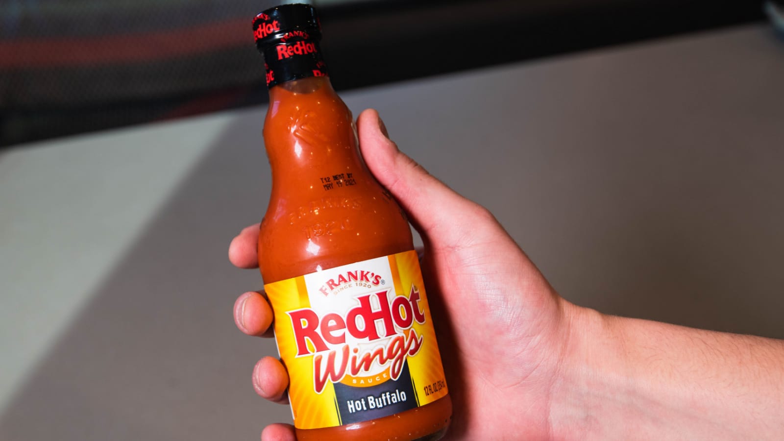 BOSTON, MASSACHUSETTS - MARCH 8, 2020: Frank's Red Hot Wings spicy hot sauce for chicken, meat, and other meals.