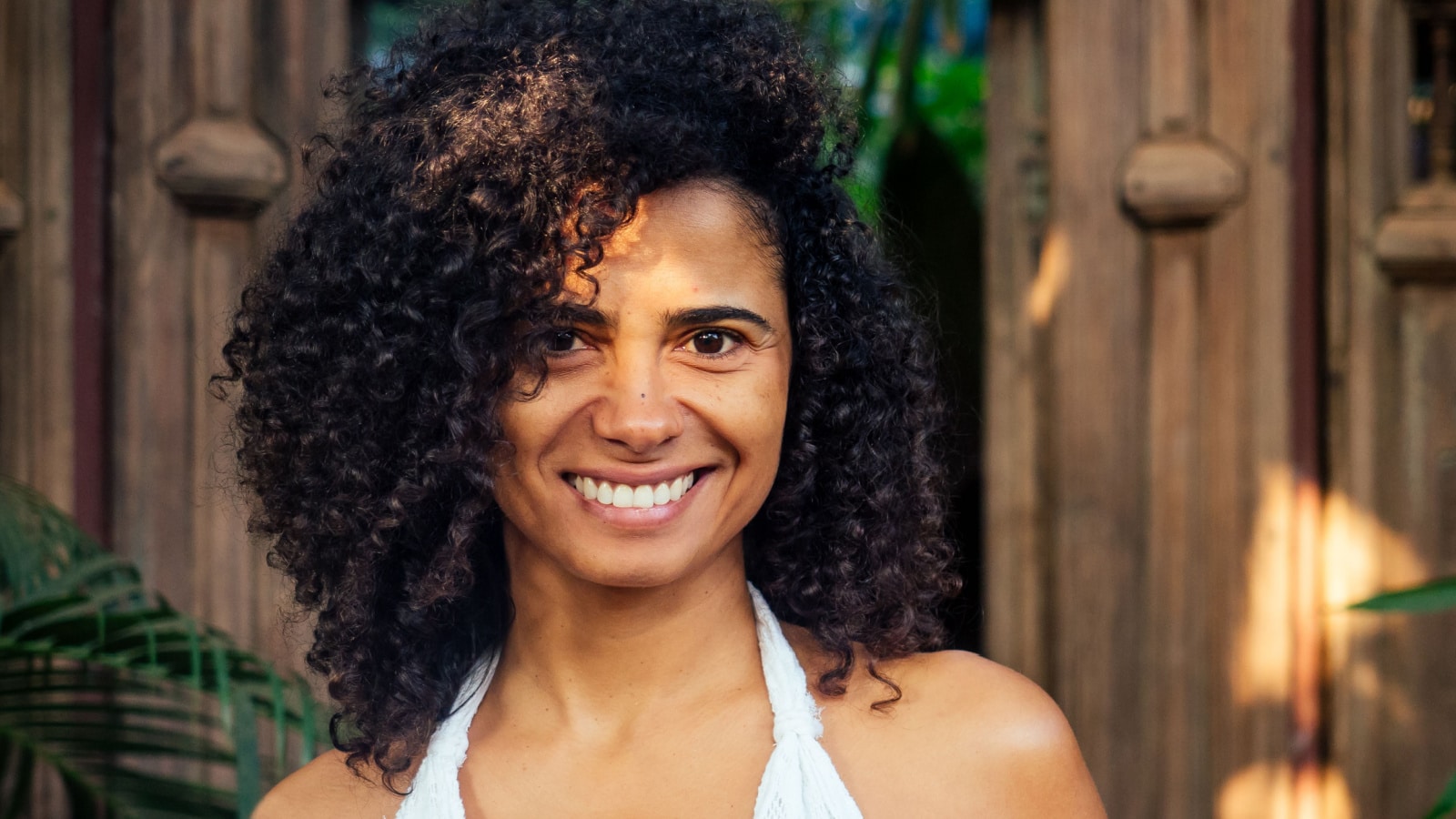 natural beautiful mixed race woman without makeup in tropical gerden park