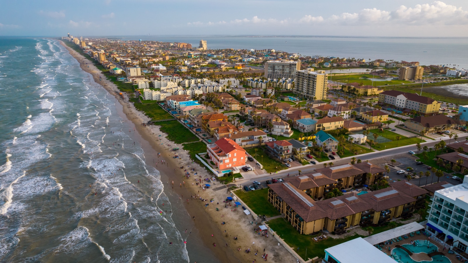 Summer beach travel destination South Padre Island Beach , Texas , USA Aerial Drone view above gorgeous South Texas Beach vacation destination