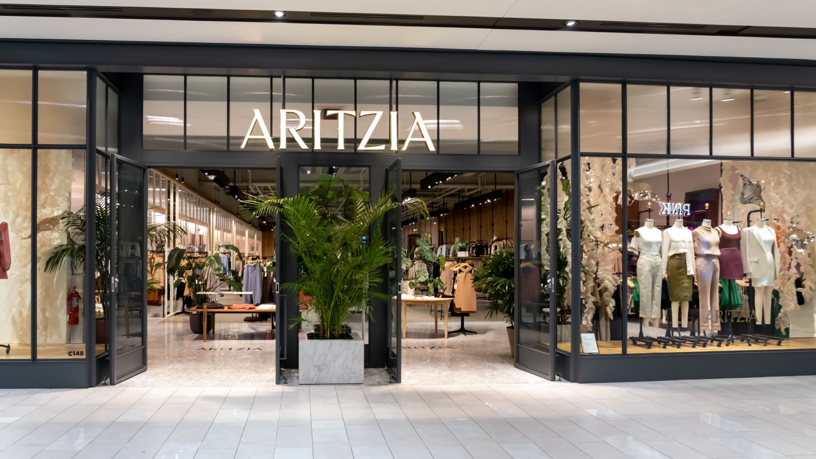 East Rutherford, NJ, USA - August 16, 2022: An Aritzia store at the American Dream mall in East Rutherford, NJ, USA. Aritzia Inc. is a Canadian women's fashion brand.