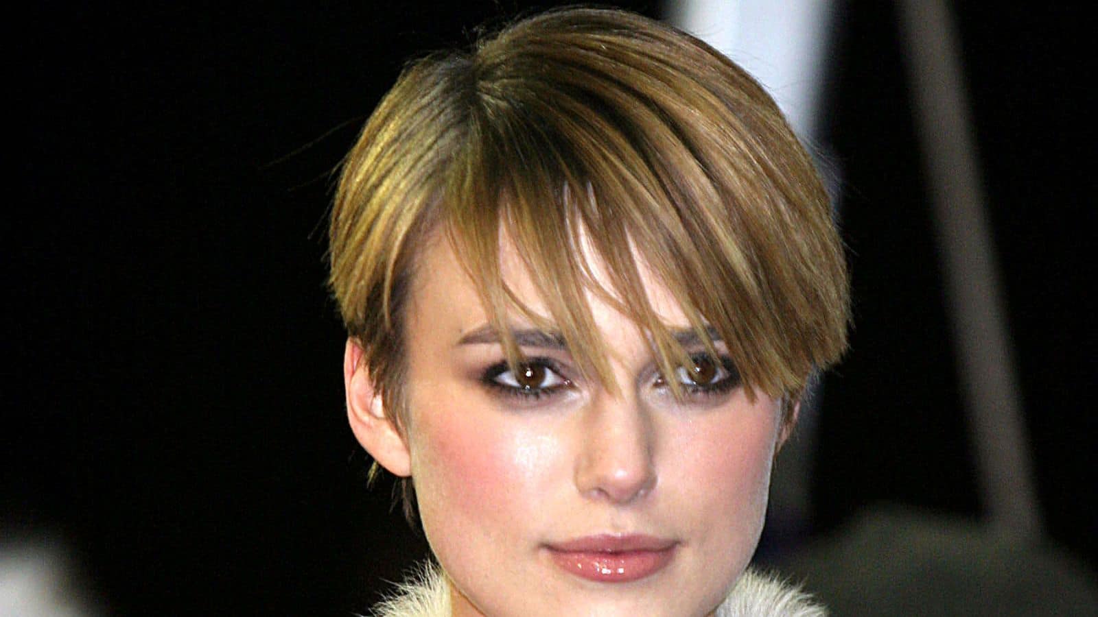Keira Knightley arrives for the 2005 SUNDANCE FILM FESTIVAL premiere of THE JACKET at the Eccles Center Theatre, January 23 2005 in Park City, Utah wearing a pixie cut haircut