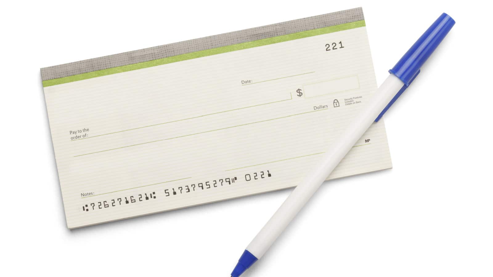 Blank check book with pen isolated on a white background.