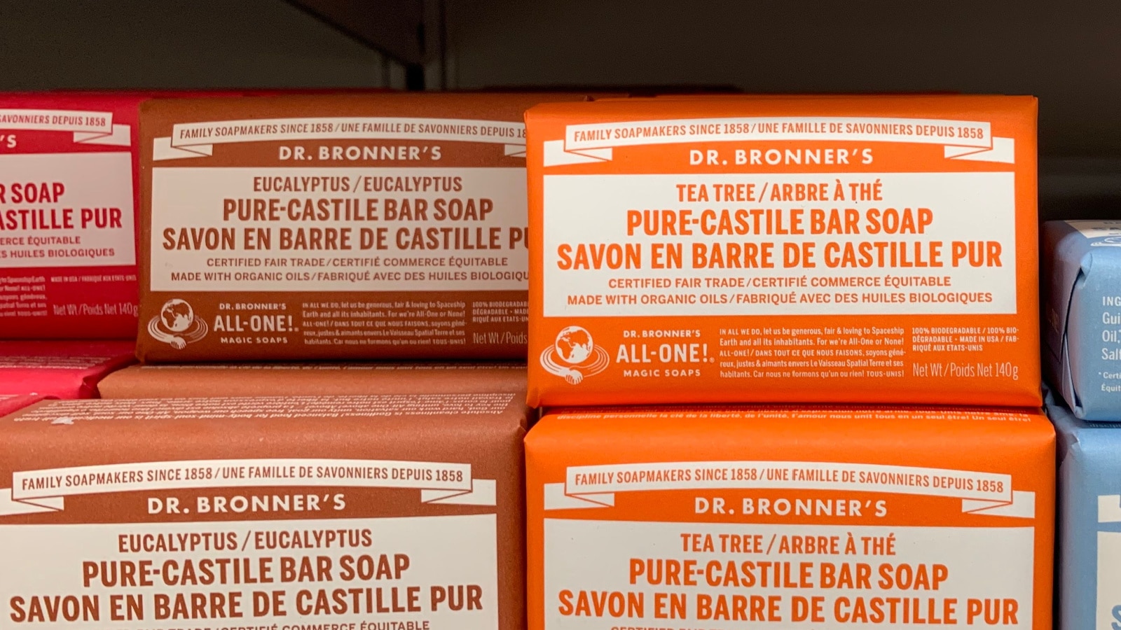 Edmonton, Canada - July 24, 2020: Various bars of Dr. Bronner’s Pure Castile Soap on a grocery store shelf