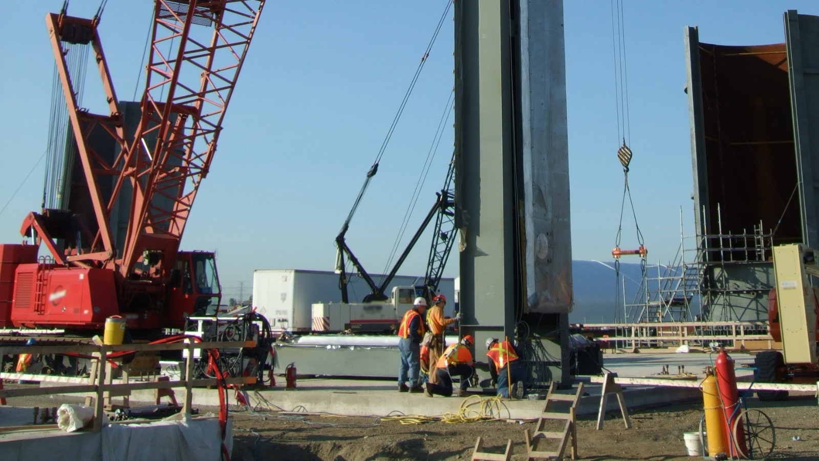 ironworks setting steel beam