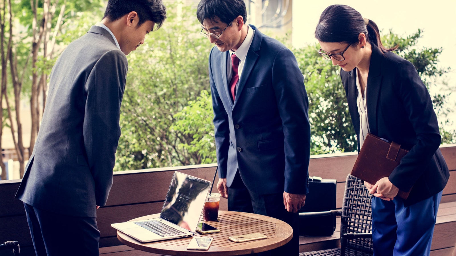 Business people greeting bowing gesture in Japan