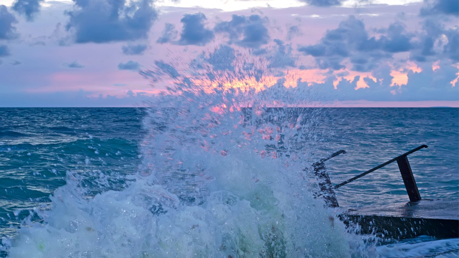 Splashing wave on the Black sea in the night.