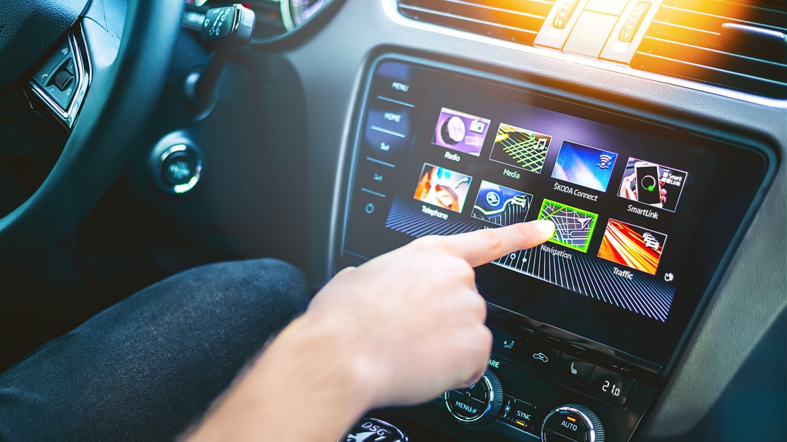 Mlada Boleslav, Czech Republic - January 4 2018: SKODA OCTAVIA - Car dashboard. Touch display with the main menu of the car. Hand touches the screen.