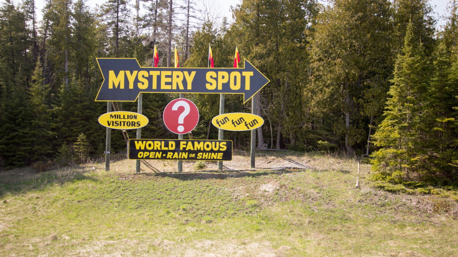 St. Ignace, Michigan, USA - May 6, 2016: Billboard sign for the famous Mystery Spot in the Upper Peninsula. The popular attraction features guided tours of an area that seems to defy gravity.