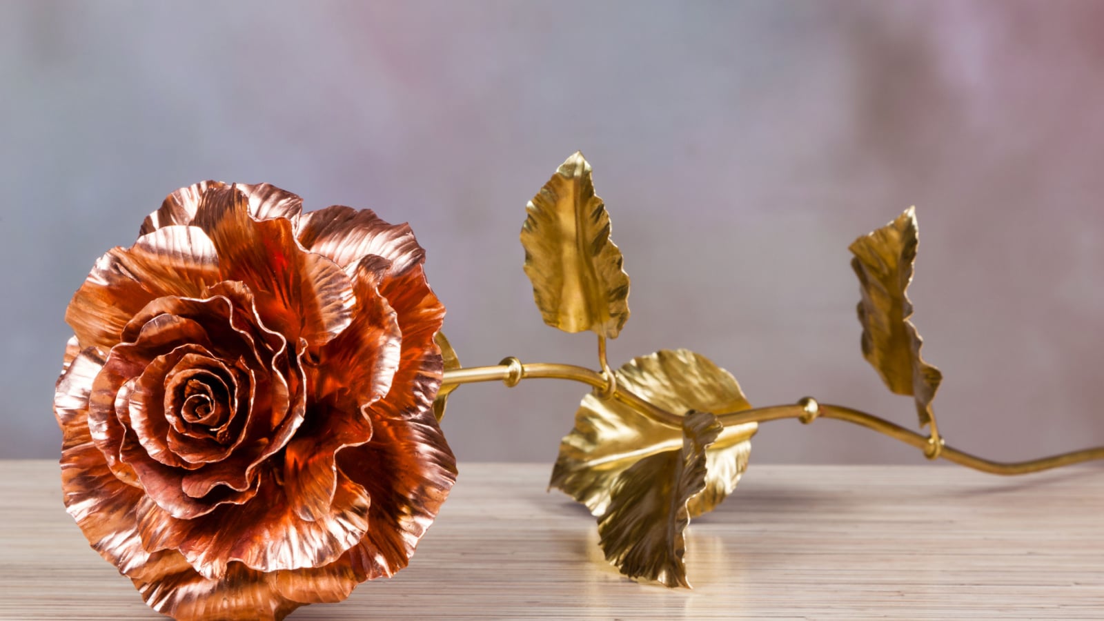 unfading copper red rose as symbol of everlasting love