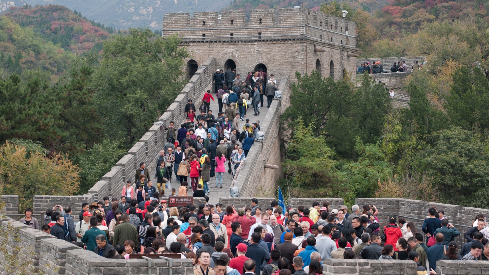 BEIJING - OCT 13, 2013 : Many visitors walks on the greatwall at weekend. The Great Wall of China is the longest man-made structure in the world.
