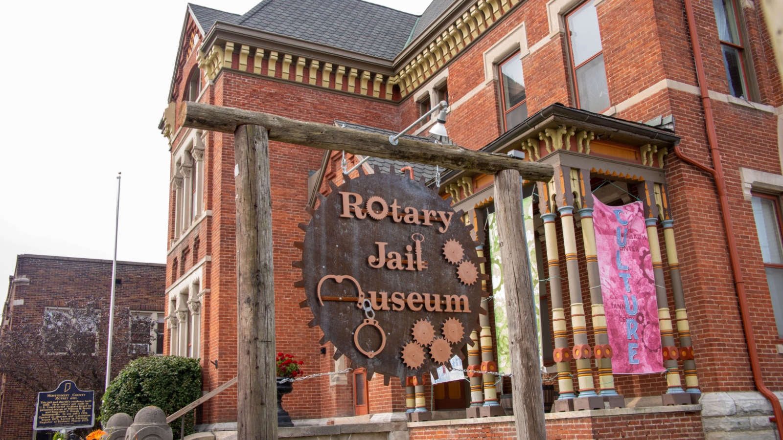 Crawfordsville, Indiana, USA - August 6, 2021 : Sign in front of the exterior of the Rotary Jail Museum in Crawfordsville, Indiana.