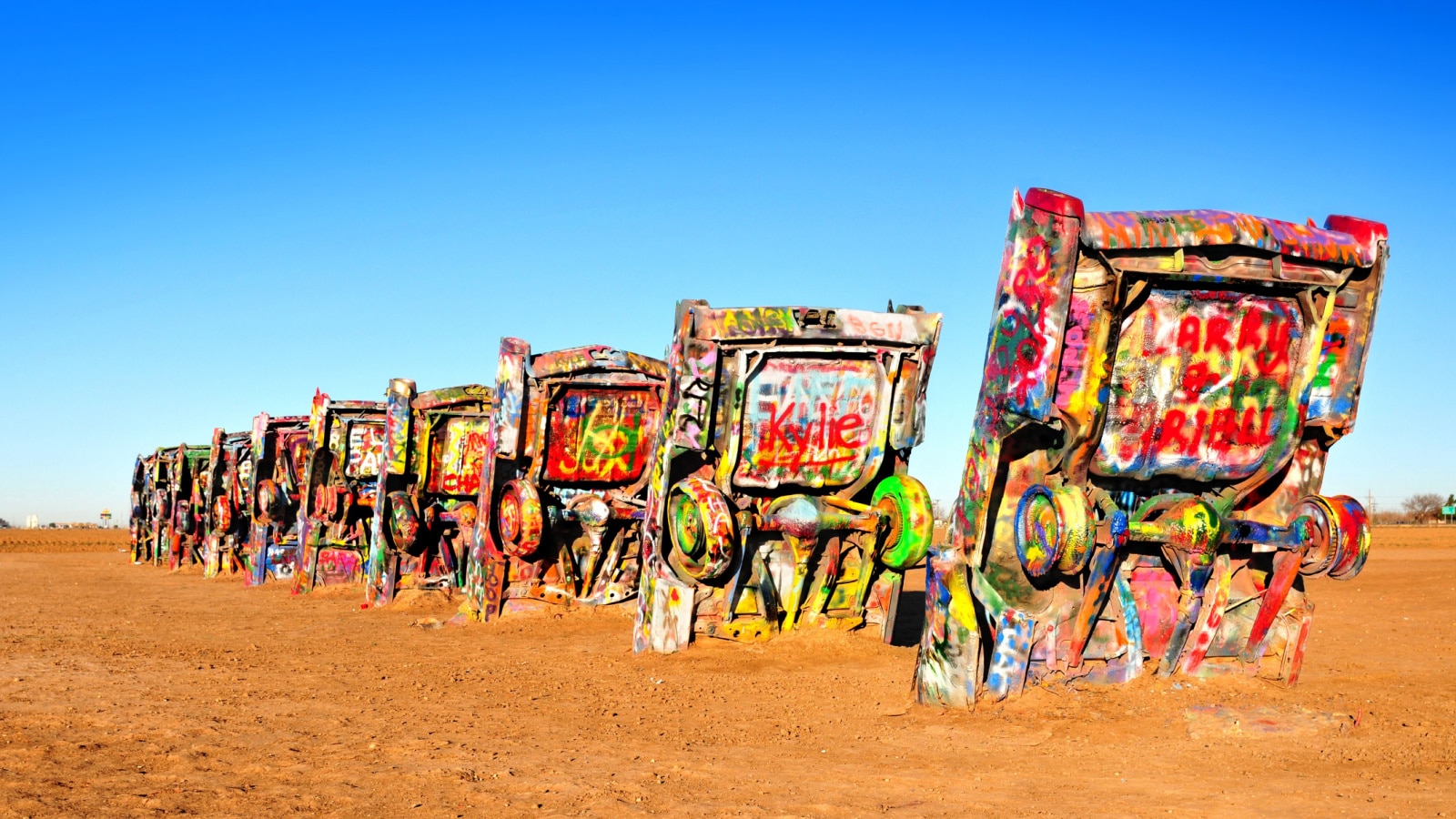 AMARILLO, TEXAS, USA - DEC. 2013: Cadillac Ranch is a public art installation and sculpture in Texas, U.S. created in 1974 by Chip Lord, Hudson Marquez and Doug Michels, of the art group Ant Farm.