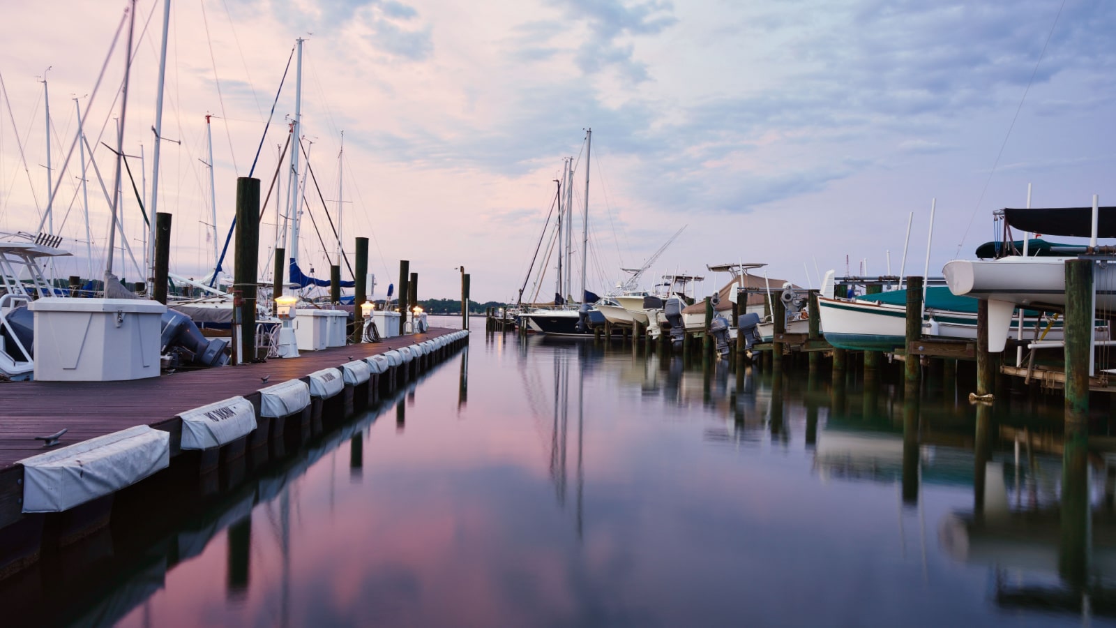 Boats in the marina at sunset. A sky in pastels over Annapolis on the Chesapeake Bay in the state of Maryland, USA.