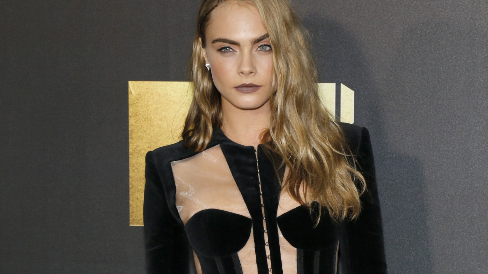 Cara Delevingne at the 2016 MTV Movie Awards held at the Warner Bros. Studios in Burbank, USA on April 9, 2016.