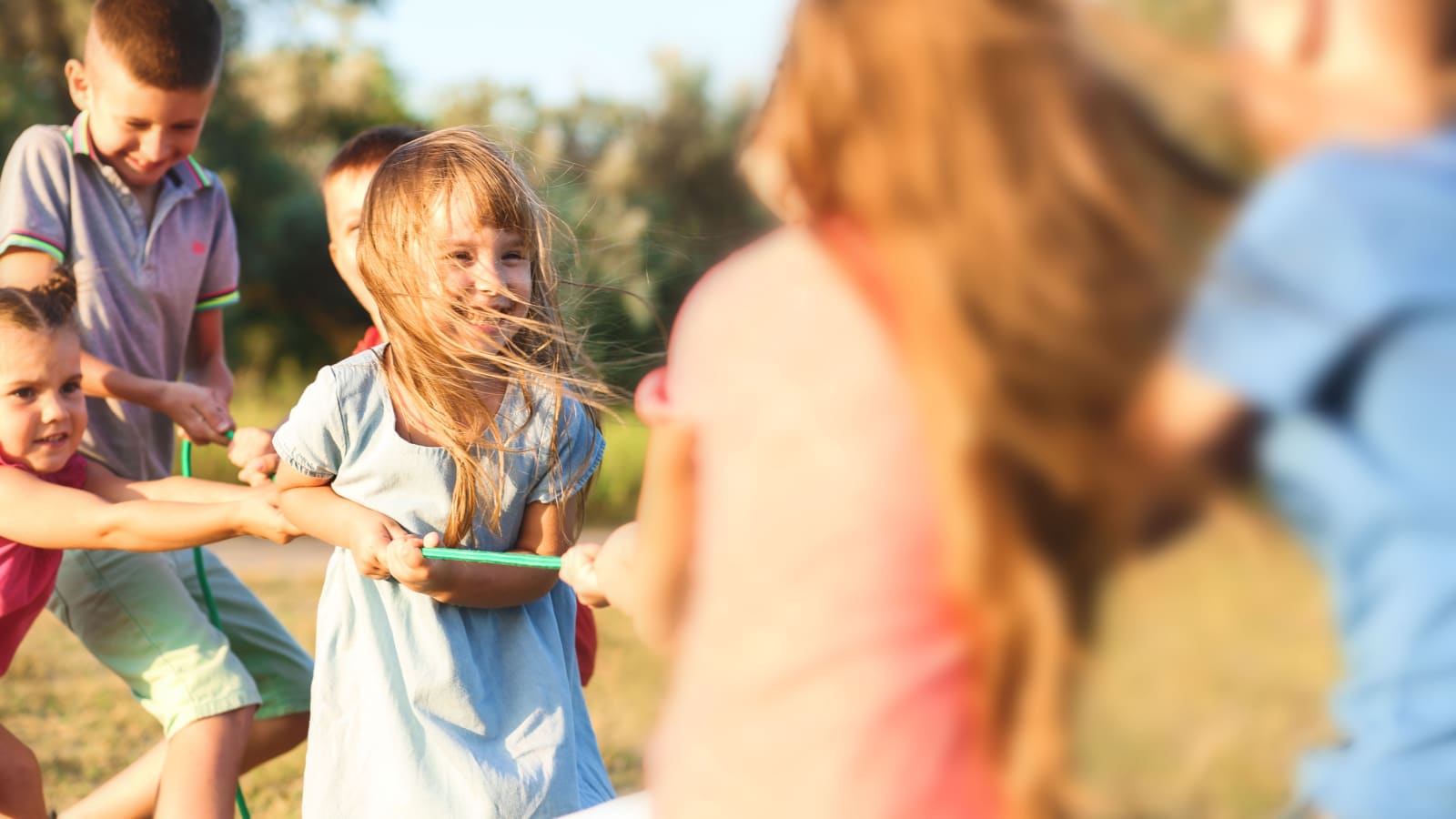 Happy kids playing in park