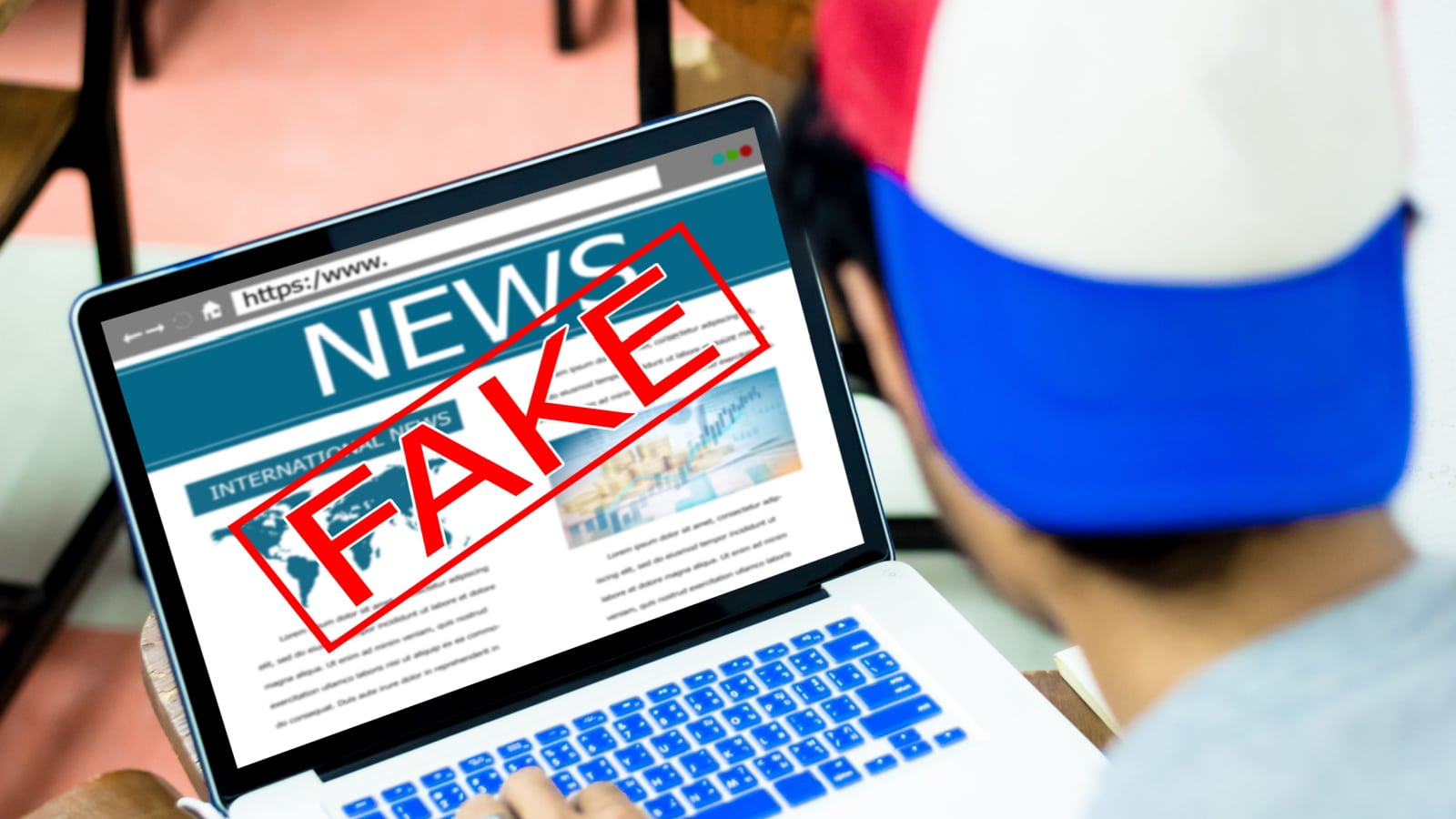 Fake news, HOAX concept.Young man using laptop or computers
