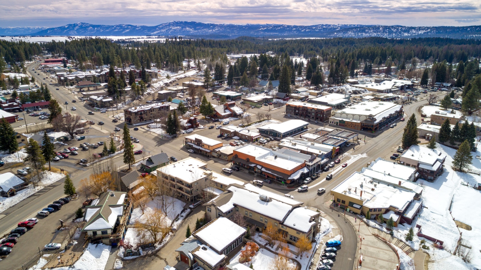 Little mountain town of McCall Idaho in winter with cars driving on the streets