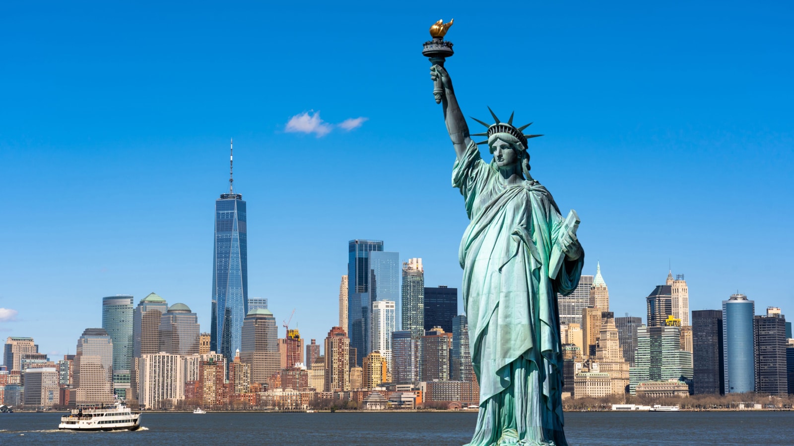 The Statue of Liberty over the Scene of New york cityscape river side which location is lower manhattan,Architecture and building with tourist concept
