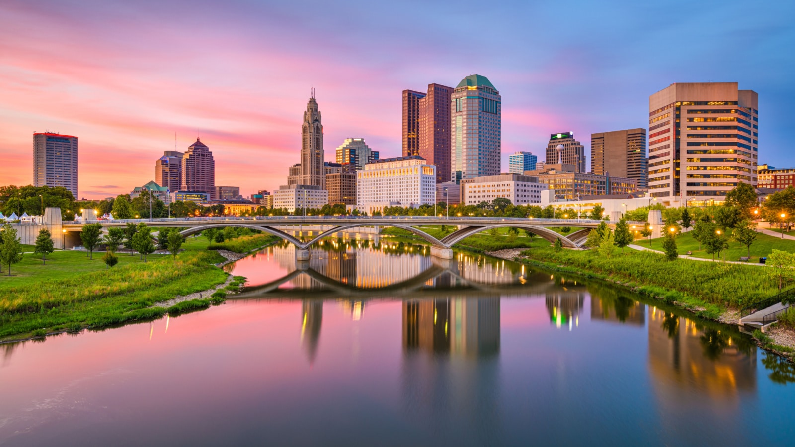 Columbus, Ohio, USA skyline on the river at dusk.