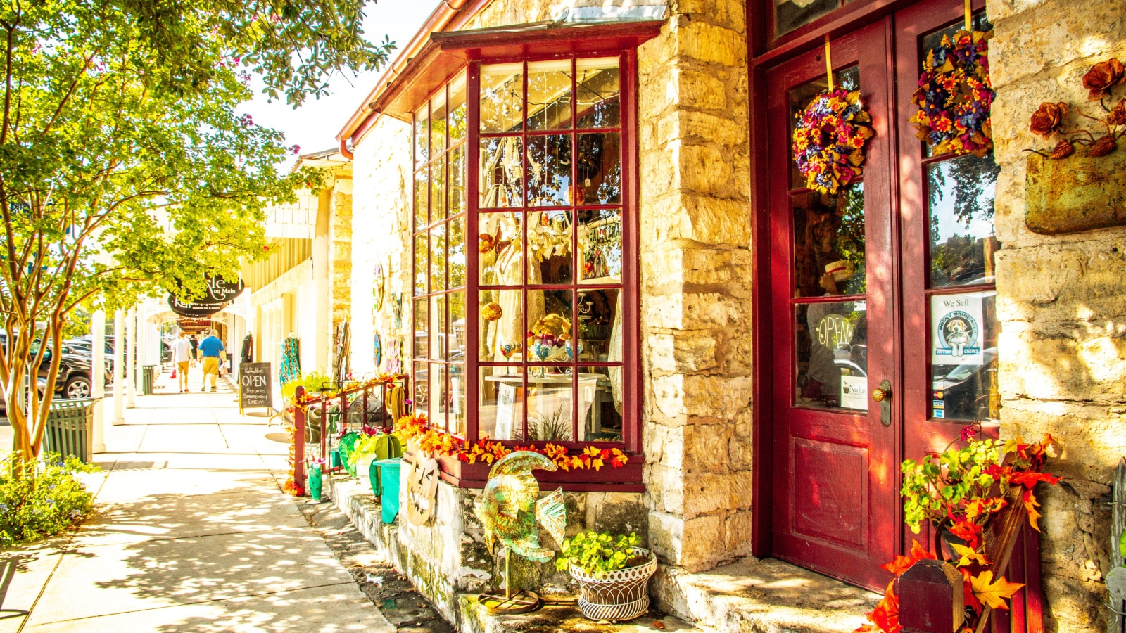 Fredericksburg, Texas, USA-07 September 2019 : The Main Street in Frederiksburg, Texas, also known as "The Magic Mile", with retail stores and poeple walking