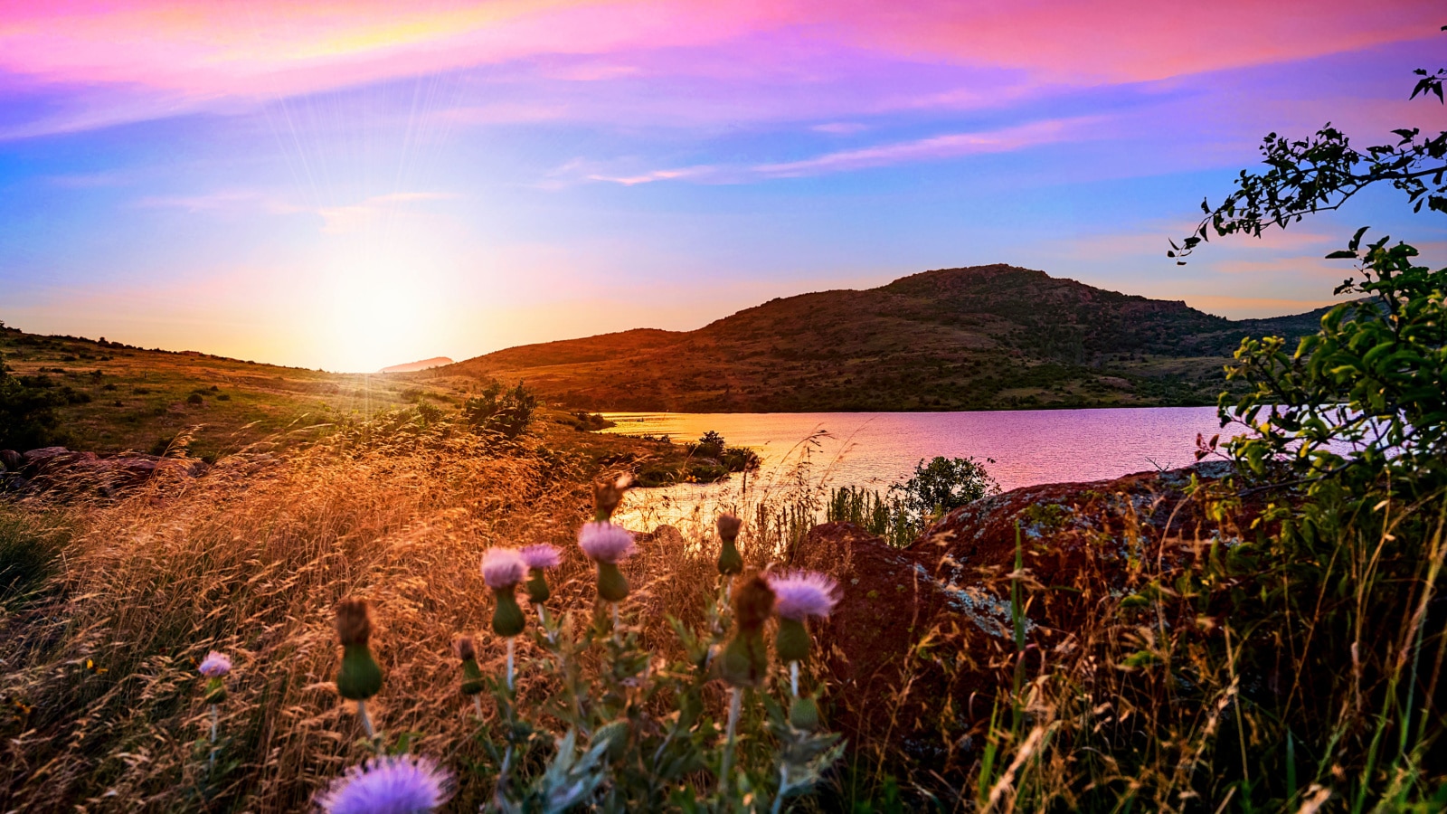 Violet hour at sunset in the valley of Wichita Mountains Wildlife Refuge near Lawton, Oklahoma, USA.