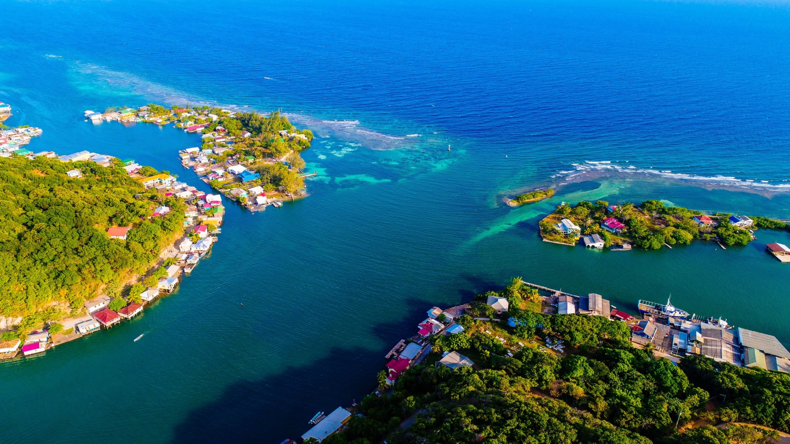 Colorful cabins located at Port Royal, eastern side of Roatan, Bay Islands of Honduras.