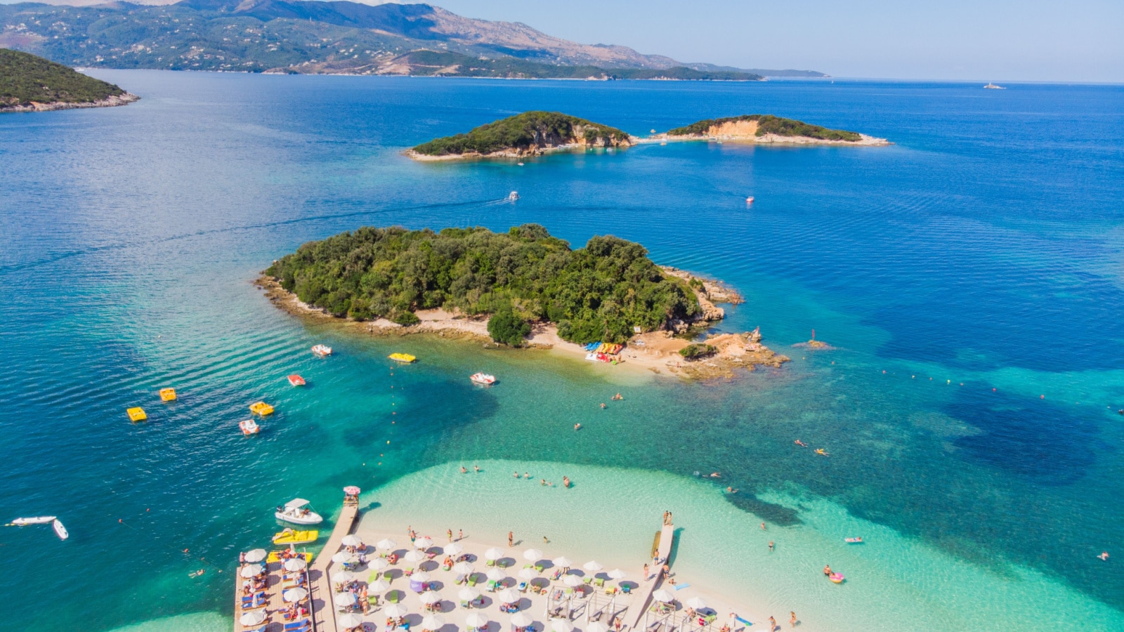 Aero Photography. View from a flying drone. Panoramic view of Ksamil, Albanian Riviera. Ksamil islands are located near the Saranda. Top View. Beautiful destinations