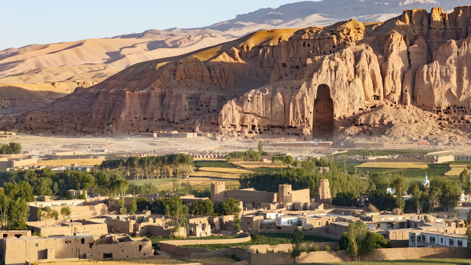 Afghanistan, Bamiyan (Bamian or Bamyan), cultural landscape and archeological remains, UNESCO World Heritage site, overview of the valley, town and empty niches where Buddha statues were destroyed