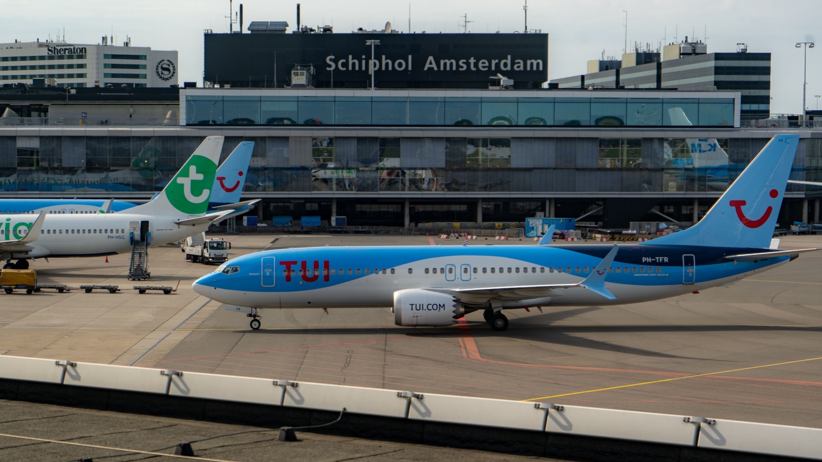Amsterdam, Netherlands - September 5th, 2022: Different Airplanes at Schiphol airport.