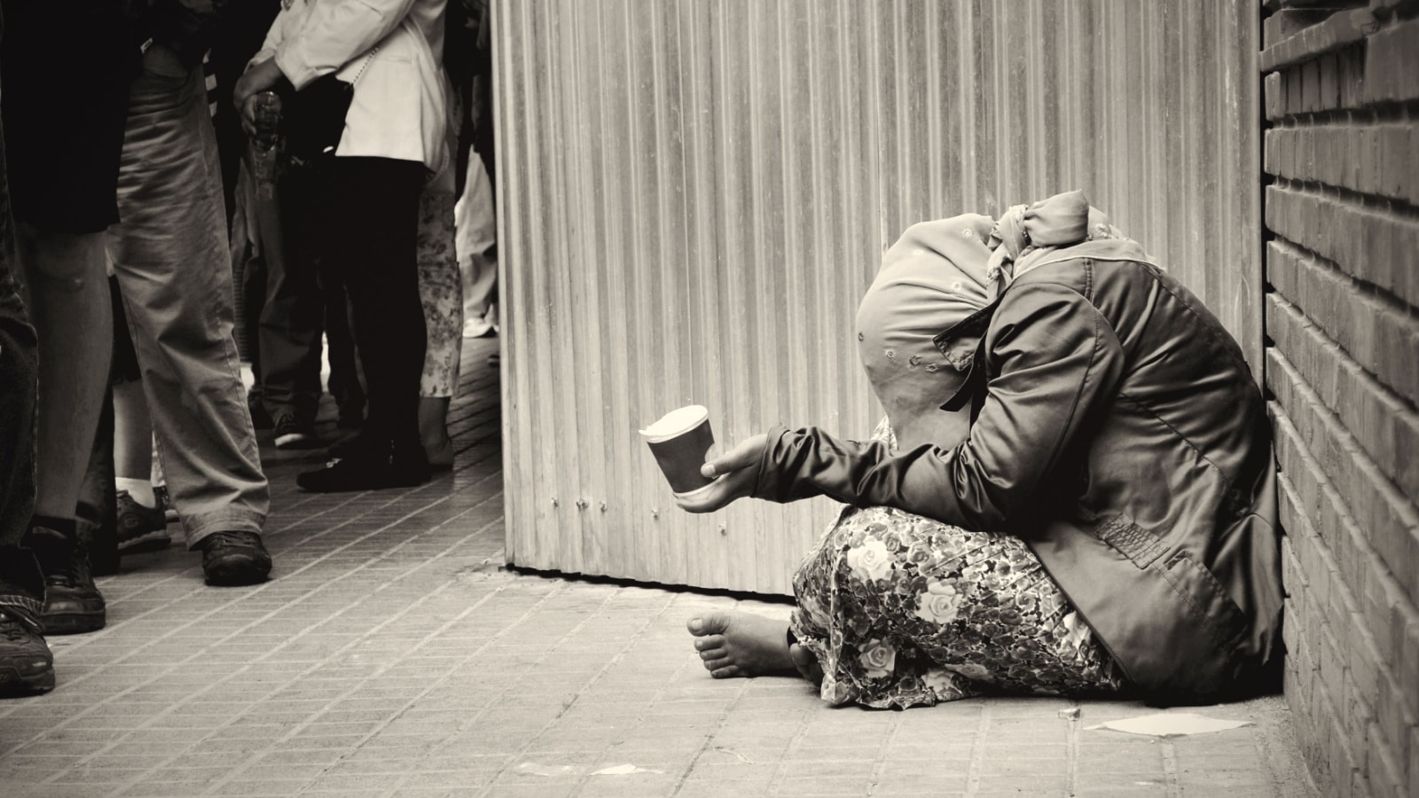 homeless girl is begging for money